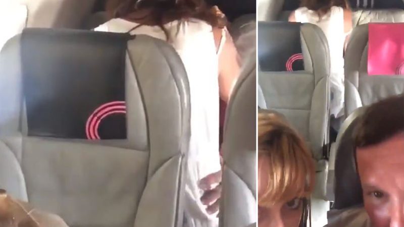 WATCH: Horny couple go viral after getting caught going at it on plane seat