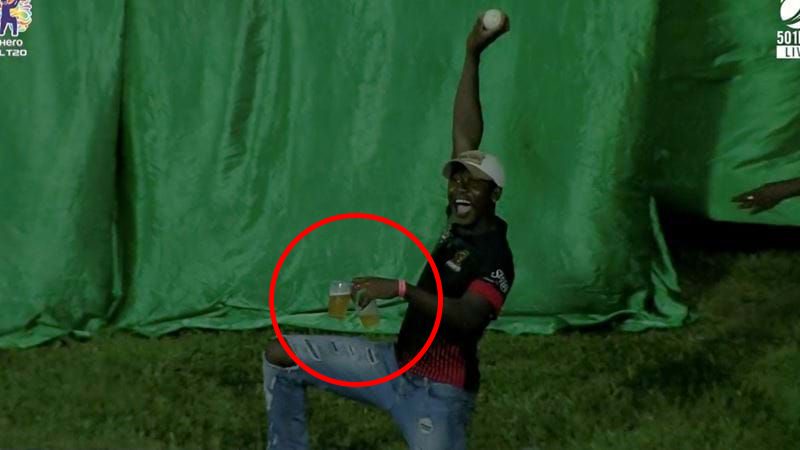 WATCH: Battler makes legendary one-handed catch while holding two beers at the cricket 