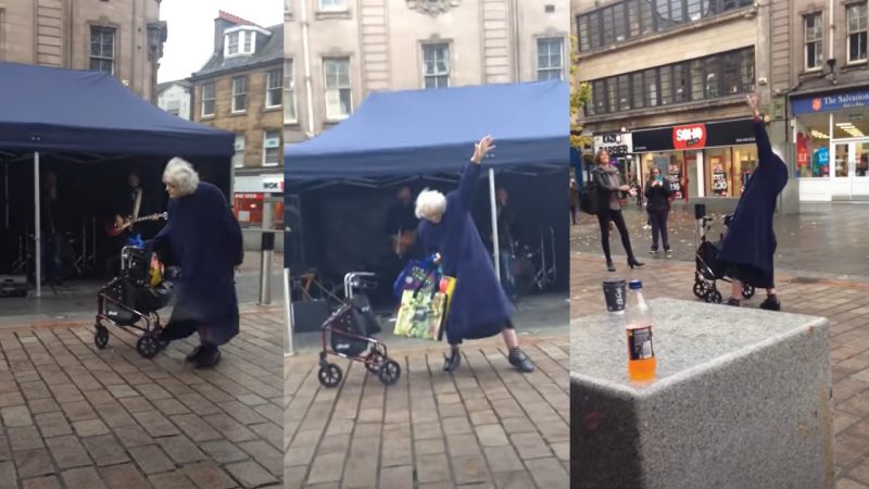 Old lady hears band playing AC/DC's 'Highway to Hell', ditches her walker to dance and rock out