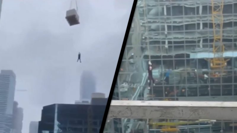WATCH: Gnarly video shows construction worker left dangling from crane by hand