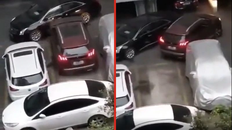 Watch: Driver repeatedly crashes into car after getting blocked in parking space