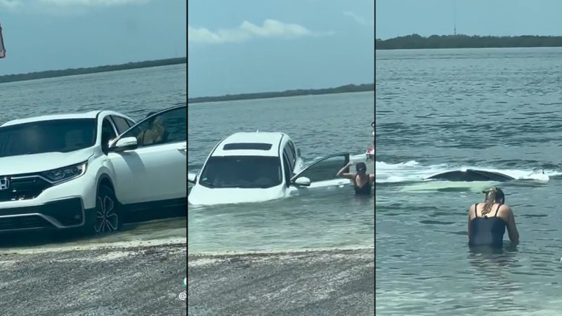 Watch: Woman reverses too far in boat ramp & completely sinks her car