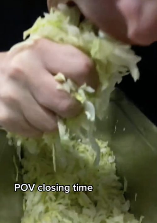kfc worker grabs lettuce
