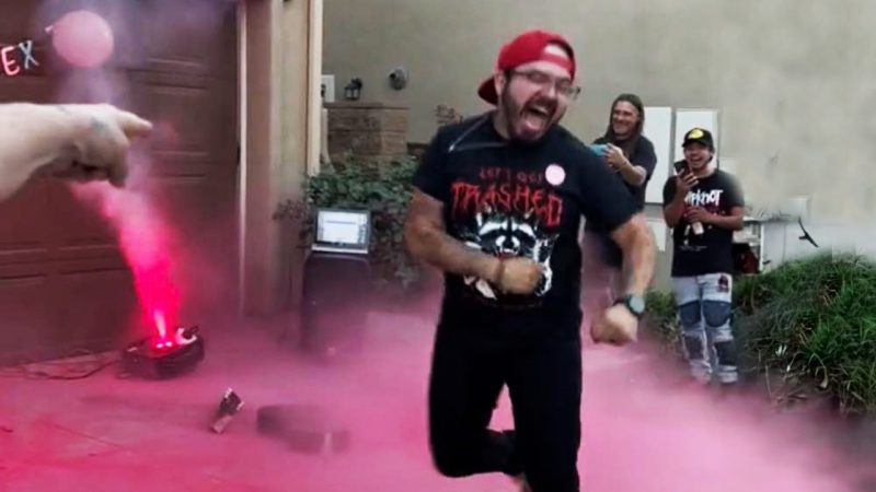 Watch the guitar-smashing stunt that's being called the 'most rock n roll gender reveal ever'